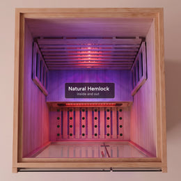 Hemlock interior of the 1-Person Full Spectrum Hemlock Sauna with heaters on