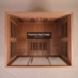 Red cedar interior and bench of the 4-Person Red Light + Full Spectrum Cedar Sauna