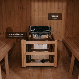 6kW Harvia stone heater between the benches of the 4-Person Outdoor Traditional Cedar Sauna